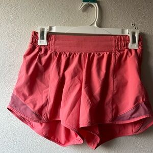 Lululemon pink / orange coral color hottie hot shorts. Size 6
